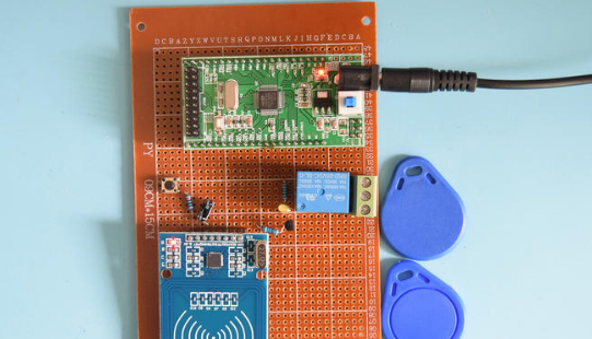 基于STM32单片机的射频RFID酒店刷卡取电开灯系统设计-万用板-电路图+程序+论文94